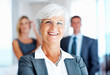 Senior business woman with colleagues