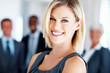 Elegant business woman with team