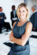 Smiling business woman with team