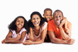 Cheerful couple smiling with two children Cheerful couple smiling with two children
