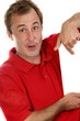 junger Mann zeigt mit dem Zeigefinger auf eine Tafel junger Mann zeigt mit dem Zeigefinger auf eine Tafel