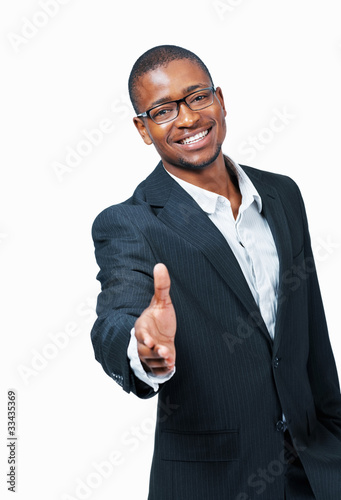 Photo: Handshake offered by business man Handshake offered by business man