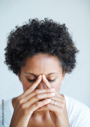 Photo: Woman suffering from headache Woman suffering from headache