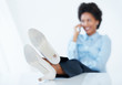 Female executive using cellphone at work