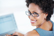 Happy business woman in glasses
