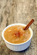 Homemade apple sauce with cinnamon stick Homemade apple sauce with cinnamon stick