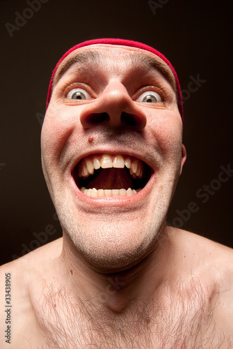 Photo: Portrait of insane surprised man Portrait of insane surprised man