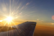 Photo: sunset above wing of an airplane with Romantic sky sunset above wing of an airplane with Romantic sky