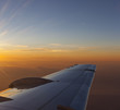 Photo: sunset above wing of an airplane with Romantic sky sunset above wing of an airplane with Romantic sky