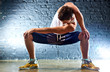 Foto: Young man sports exercises Young man sports exercises