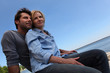 lovers by seafront