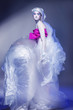 Beauty brunette in white plastic dress Beauty brunette in white plastic dress