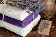 Set of natural soap, towels and lavender bouquet