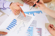 financial and business documents on the table