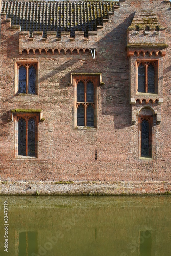 Photo: Reflection of the wall in the moat. Reflection of the wall in the moat.