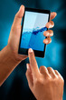A woman use a mobile phone