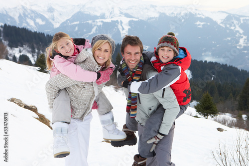 Photo: Young Family On Winter Vacation Young Family On Winter Vacation