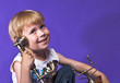 Happy boy speaking on the phone