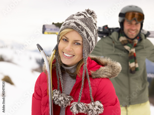 Photo: Young Couple On Ski Vacation Young Couple On Ski Vacation