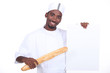 Baker with a baguette and a board left blank for your message