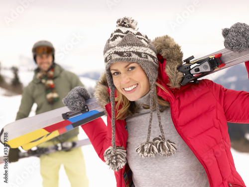 Photo: Young Couple On Ski Vacation Young Couple On Ski Vacation