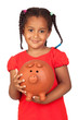 African little girl with a big piggy-bank