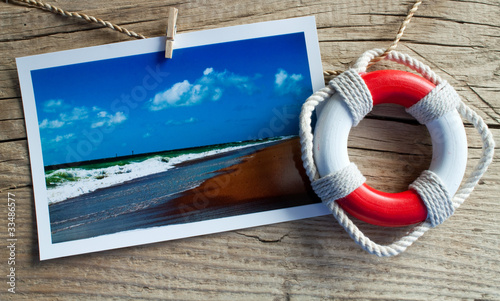 Foto: Strand Postkarte mit Rettungsring Strand Postkarte mit Rettungsring