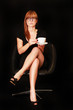 Foto: elegante junge Frau mit Tasse elegante junge Frau mit Tasse