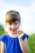 ����: girl with flower in a meadow. focus on flower. � ievavincer2 #33492136