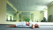 Young adult is doing yoga. Tripod. Part 2 of 8