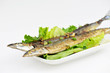 Photo: grilled saury on white plate grilled saury on white plate