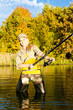 woman fishing in pond