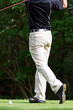 doing a golf stroke