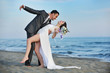 romantic beach wedding at sunset
