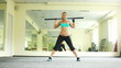 Women is doing exercises with Body Bar. Part 1. Dolly HD.