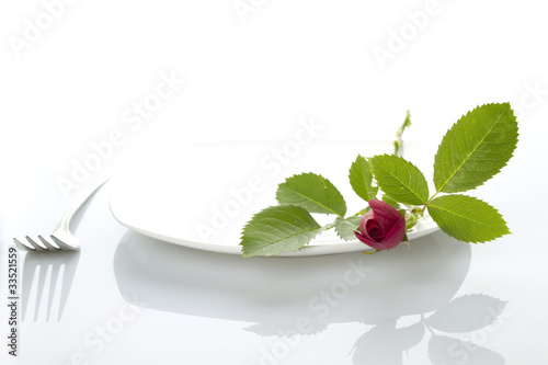 Photo: Place setting with rose Place setting with rose