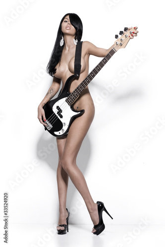 Photo: nude girl with a guitar nude girl with a guitar