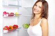 Foto: Picking food from fridge Picking food from fridge