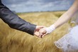 just married couple holding hands