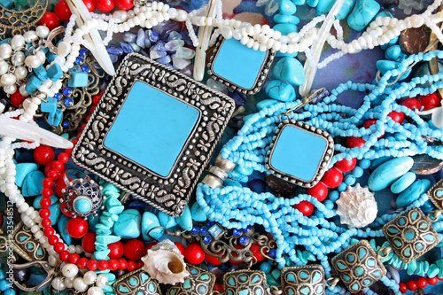 Photo: Background with turquoise, shells and pearls Background with turquoise, shells and pearls