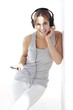 Photo: young woman listening to music young woman listening to music