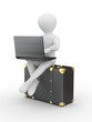 Man with laptop on the luggage