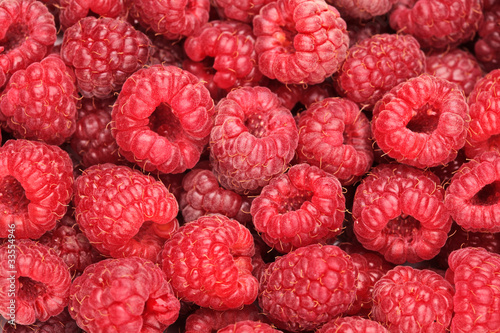Photo: A raspberry background A raspberry background