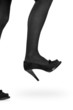 Foto: Woman shoe stepping on something Woman shoe stepping on something