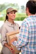 Female courier delivering package
