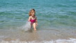 little girl splash water and fun