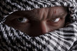 Serious middle eastern man looking to you