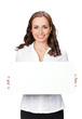 Smiling businesswoman showing blank signboard, isolated