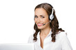 Young support phone operator in headset with laptop, isolated
