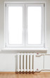 White plastic window with radiator under. Isolated on white White plastic window with radiator under. Isolated on white